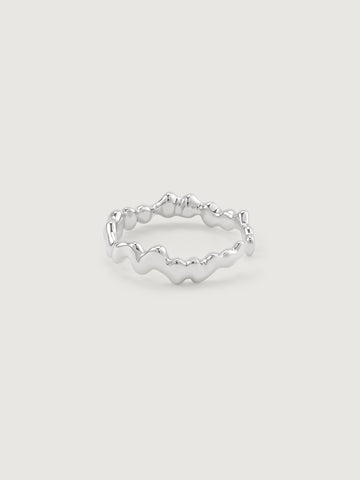 Silver ring with a textured weave design on a light gray background